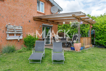 Stilvolles Architektenhaus mit lichtdurchfluteten Räumen, Kamin & Dachterrasse in Scharnebeck - Die Maackler OHG (15652)