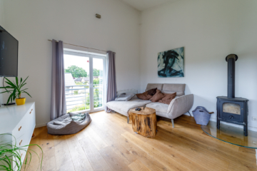 Stilvolles Architektenhaus mit lichtdurchfluteten Räumen, Kamin & Dachterrasse in Scharnebeck - Die Maackler OHG (15673)