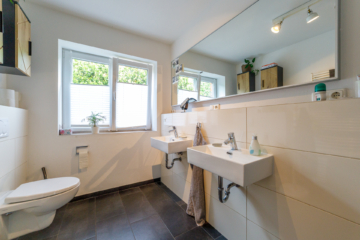 Stilvolles Architektenhaus mit lichtdurchfluteten Räumen, Kamin & Dachterrasse in Scharnebeck - Die Maackler OHG (15665)