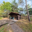 DieMaacklerOHG - Haus im Grünen: Blockhaus mit großem Garten und sanierungsbedürftigem Altbestand