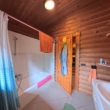 DieMaacklerOHG - Haus im Grünen: Blockhaus mit großem Garten und sanierungsbedürftigem Altbestand