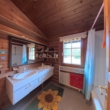 DieMaacklerOHG - Haus im Grünen: Blockhaus mit großem Garten und sanierungsbedürftigem Altbestand