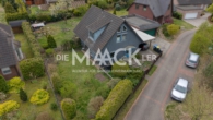 Die Maackler OHG - Charmantes Einfamilienhaus in Bienenbüttel – Holzhaus mit Keller, Garten & 750 m² Grundstück