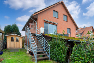 Großzügige 5-Zimmer-Wohnung im Zweifamilienhaus – Wohnen mit Komfort und Nachhaltigkeit - DieMaacklerOHG (11844)