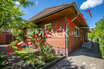 Familienfreundlicher Bungalow am Feldrand von Reppenstedt - 127 m² mit großem Keller - Hausansicht (17595)