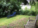 Gartenfläche hinterm Haus - Investieren in Lüneburg – Attraktives 6-Parteienhaus in Bestlage